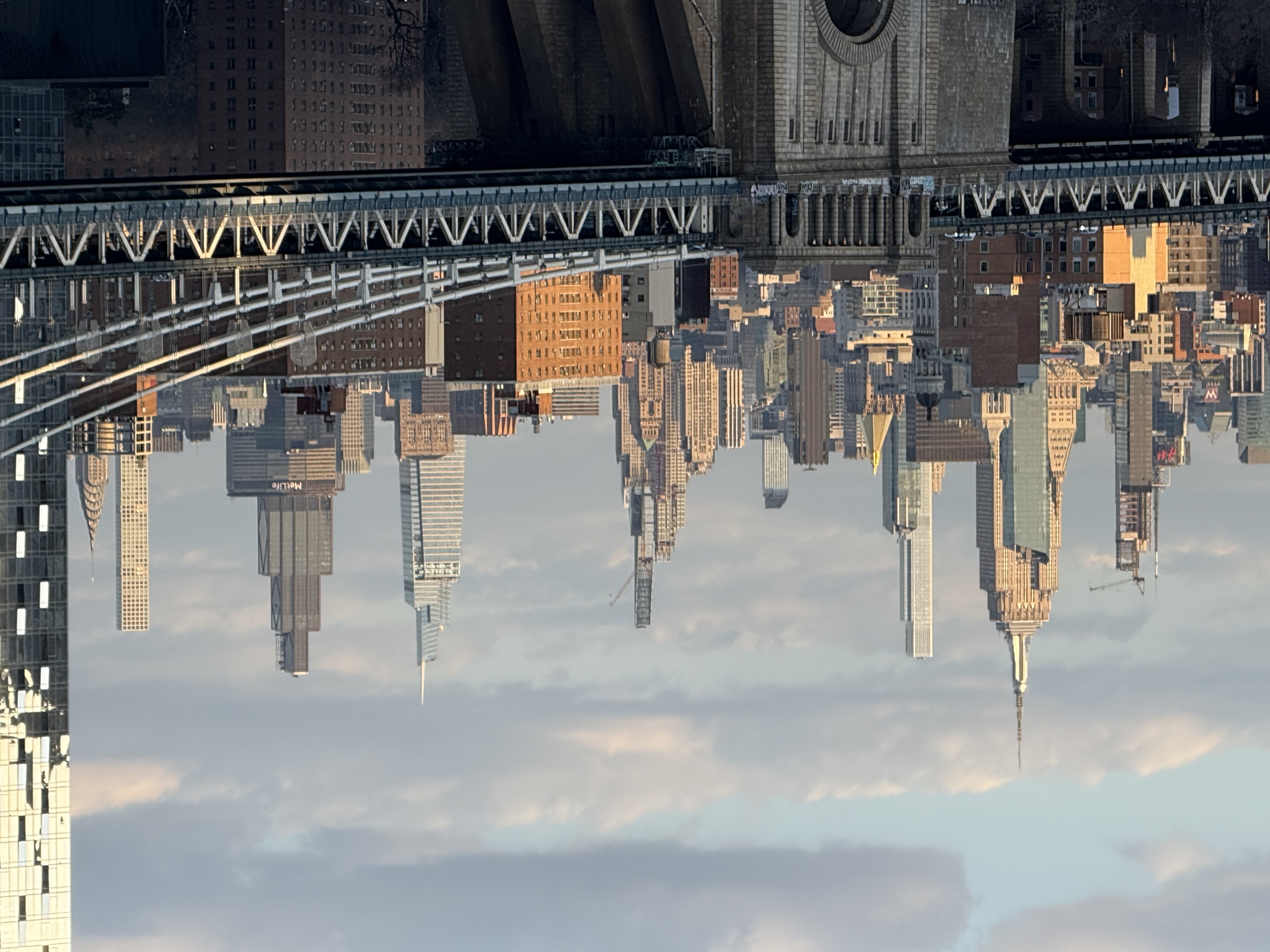 empire state building and chrysler in sunset