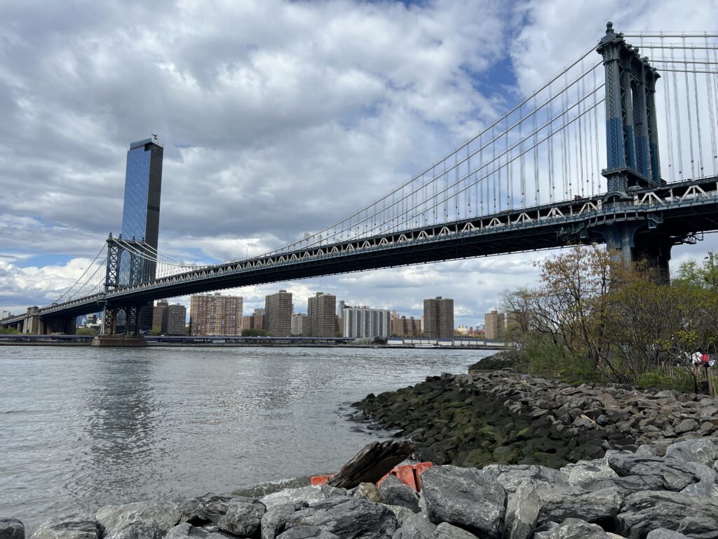 manhattan bridge as seen from pebble beach