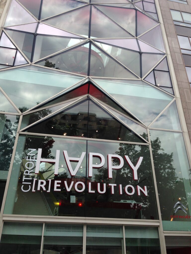 front of a citroen store at champs-elysees