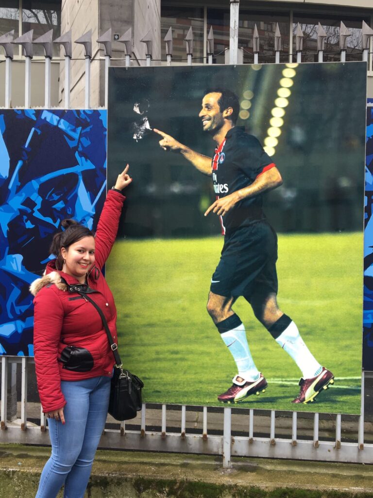 me posing with psg poster